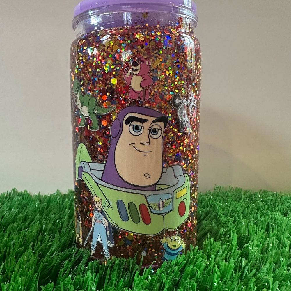 16 oz Plastic Toy Story Glitter Snowglobe Tumbler with Purple Lid